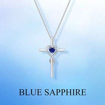 Damen Halskette mit Unendlichkeit Symbol Kreuz Anhänger Kette Infinity aus 925 Sterling Silber mit Synthetischer Saphir Edelstein Herz Form September Geburtsstein - Verstellbar Kettenlänge: 40 + 5 cm - 7