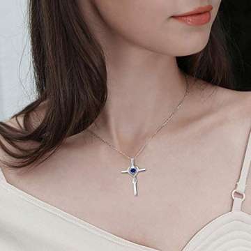Damen Halskette mit Unendlichkeit Symbol Kreuz Anhänger Kette Infinity aus 925 Sterling Silber mit Synthetischer Saphir Edelstein Herz Form September Geburtsstein - Verstellbar Kettenlänge: 40 + 5 cm - 8